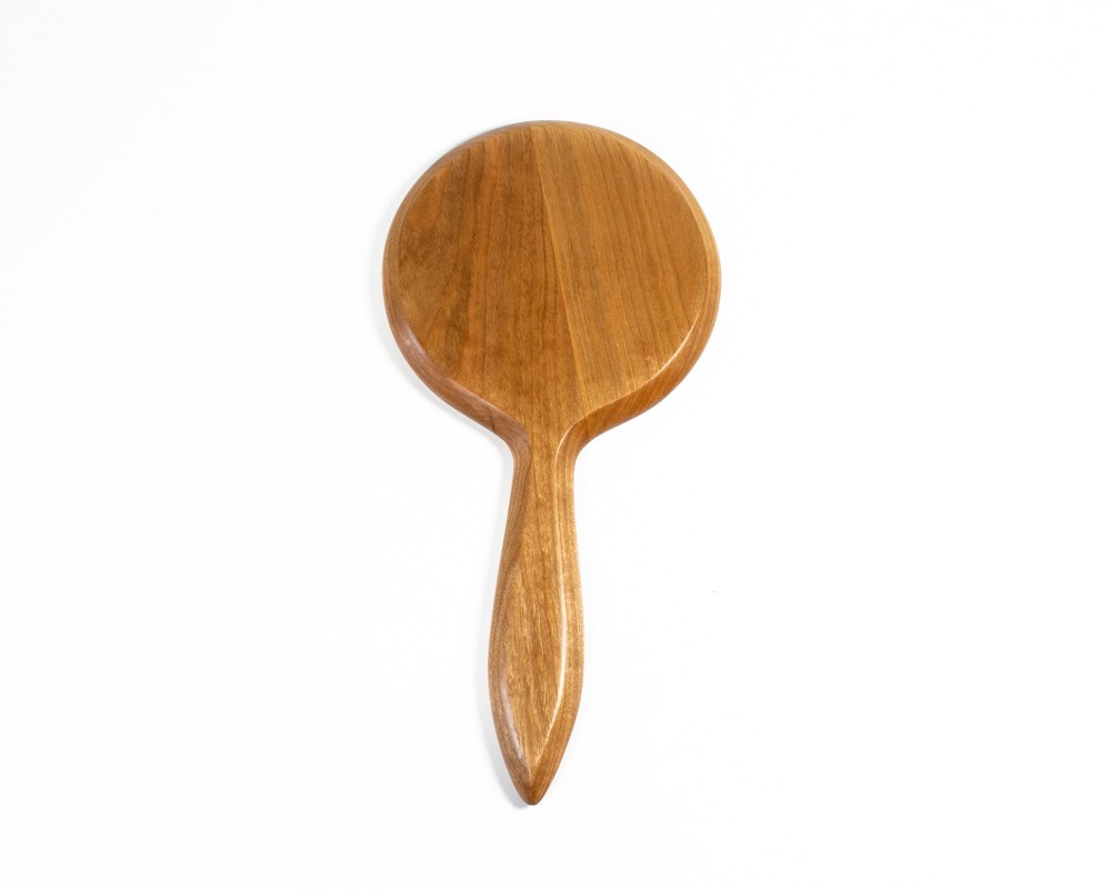 Back of Cherry hand mirror showing wood grain